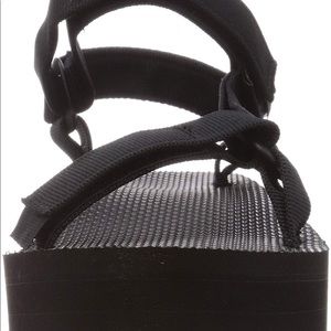 Teva black strap sandals size 7